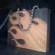 UPRIGHT FLAME PURSE-1 side